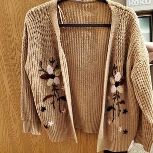 Tan with embroidered floral design